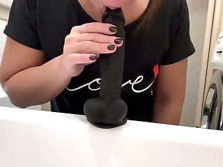 Asian Wifey Fucks Black Fake Penis In The Bathroom While Hubby Observes Tv